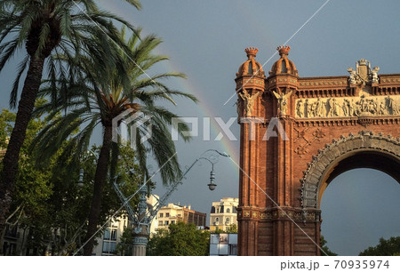 Rainbow over the Arc de Triomphe in Barcelona. Rainbow over the Arc de Triomphe in Barcelona. 70935974