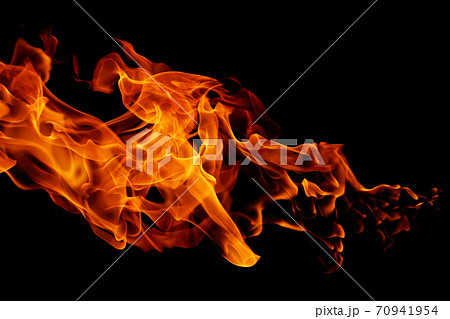 movement of fire flames isolated on black background. movement of fire flames isolated on black background. 70941954