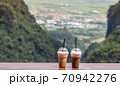 Ice coffee and ice cocoa on mountain background 70942276