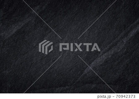 Dark grey black slate background or natural stone texture. Dark grey black slate background or natural stone texture. 70942373