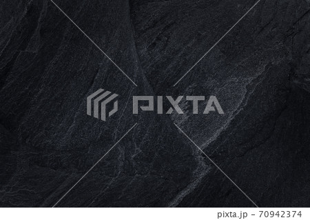 Dark grey black slate background or natural stone texture Dark grey black slate background or natural stone texture 70942374