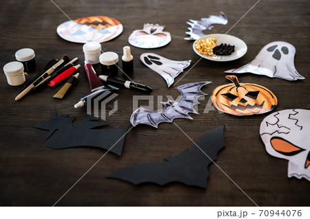 Preparing Halloween decoration Preparing Halloween decoration 70944076
