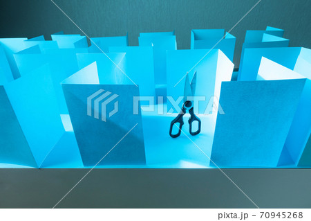 Scissors in paper labyrinth. Concept of theme of bureaucracy. 70945268
