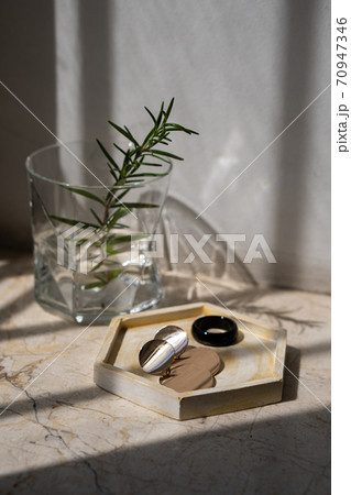 Jewelry earrings in storage tray close-up shot 70947346