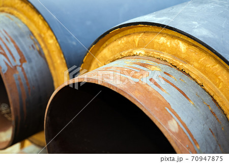 The pipeline is rusty and insulated 70947875