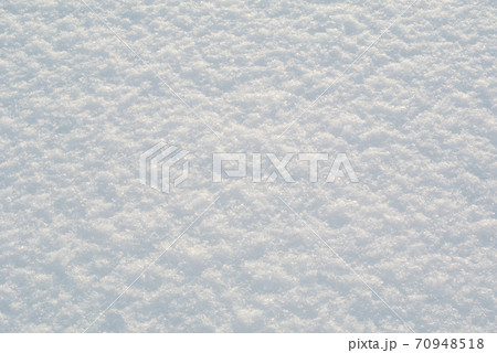 Snow surface under bright winter sunlight Snow surface under bright winter sunlight 70948518