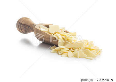 Grated white chocolate. Chocolate flakes isolated on white background. 70954819