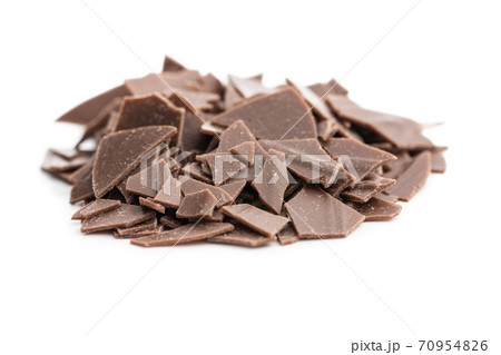 Grated dark chocolate. Chocolate flakes isolated on white background. 70954826