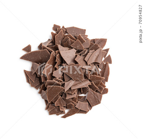 Grated dark chocolate. Chocolate flakes isolated on white background. Grated dark chocolate. Chocolate flakes isolated on white background. 70954827