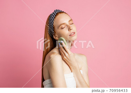 Picture of beautiful redhead woman with body sponge Picture of beautiful redhead woman with body sponge 70956433