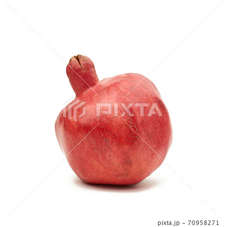 round red ripe pomegranate fruit in peel isolated on a white background round red ripe pomegranate fruit in peel isolated on a white background 70958271