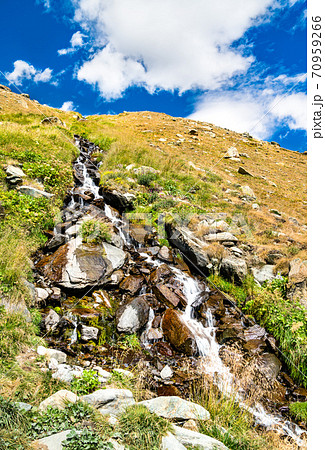 Stellisee brook at the Pennine Alps in Switzerland 70959266