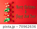 Christmas background, Christmas box with red ribbon and green ribbon, red ball and gold star on red background. Christmas background and Happy New Year for background 70962636