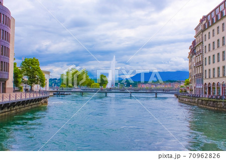 Exterior views of the buildings and fountain at the Geneva Lake 70962826