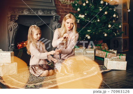 Mother with cute daughter at home 70963126