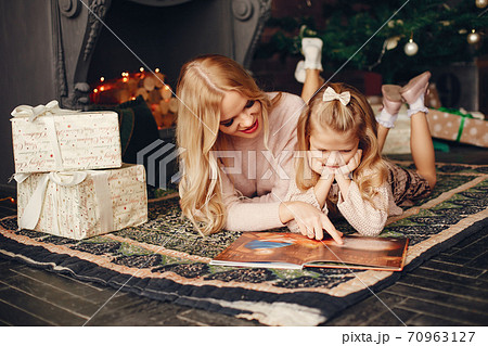 Mother with cute daughter at home 70963127