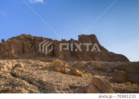 Rocky desert peaks of the Atlas mountains in the late morning Rocky desert peaks of the Atlas mountains in the late morning 70981210
