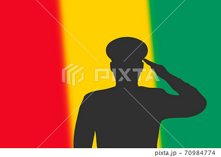 Solder silhouette on blur background with Guinea flag. Solder silhouette on blur background with Guinea flag. 70984774
