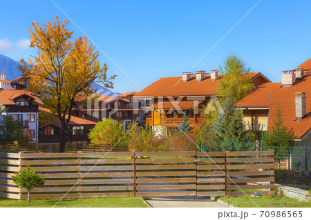 Bansko, Bulgaria, autumn trees and houses Bansko, Bulgaria, autumn trees and houses 70986565