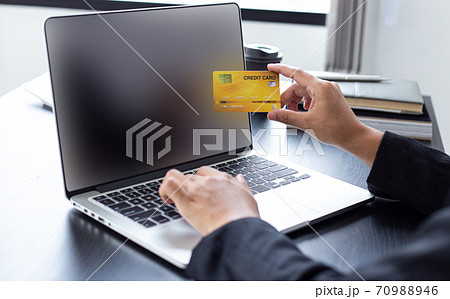 women use laptop to register online purchases using credit card payments, Convenience in the world of technology and the internet, Shopping online and banking online concept. women use laptop to register online purchases using credit card payments, Convenience in the world of technology and the internet, Shopping online and banking online concept. 70988946