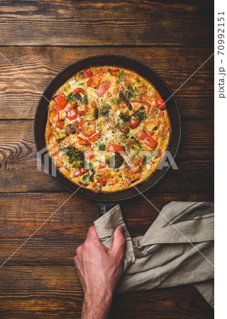 Vegetable frittata in cast iron pan Vegetable frittata in cast iron pan 70992151