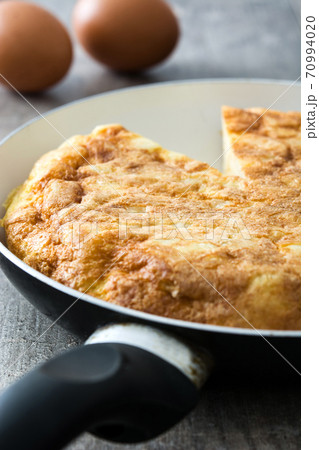 Traditional spanish omelette on rustic wooden table Traditional spanish omelette on rustic wooden table 70994020