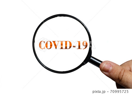 covid 19 and magnifying glass 70995725