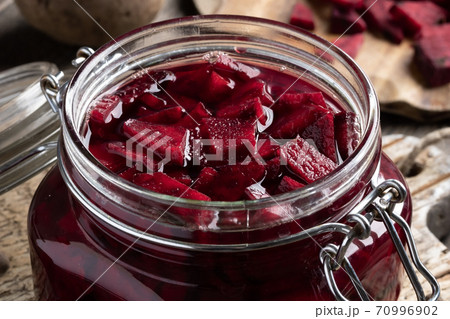 Fermented red beets in a glass jar Fermented red beets in a glass jar 70996902