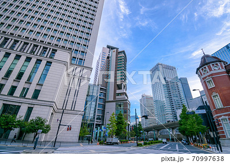 東京都 東京駅丸の内北口前と高層ビル群の写真素材