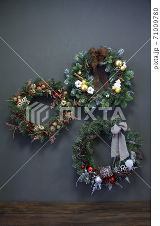 Christmas wreaths decorated with fir branches, Christmas balls and natural materials, New Year 71009780