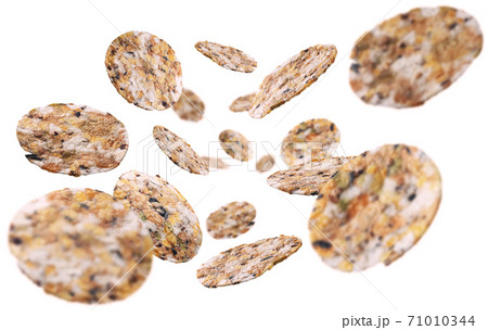Round Crispbread levitate on a white background Round Crispbread levitate on a white background 71010344