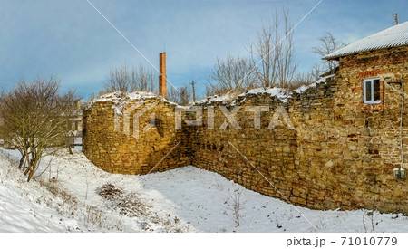 Old castle in the village of Mykulyntsi, Ukraine 71010779
