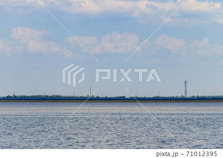 Solar power station on a bank of lake. Renewable energy Solar power station on a bank of lake. Renewable energy 71012395