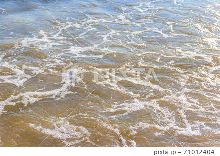 Soft wave of sea on sandy beach Soft wave of sea on sandy beach 71012404