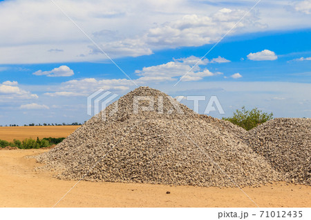 Piles of gravel for road construction Piles of gravel for road construction 71012435