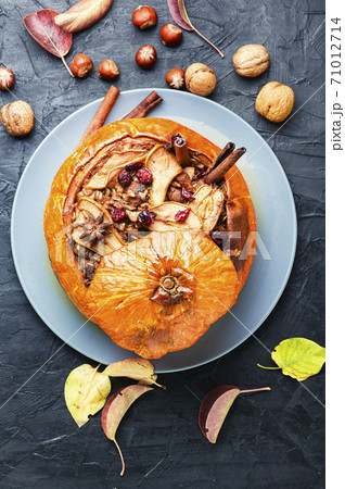 Tasty autumn stuffed pumpkin Tasty autumn stuffed pumpkin 71012714