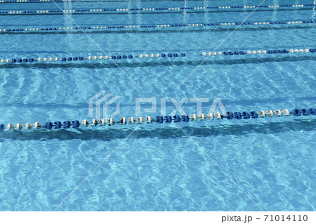 sunny outdoor swimming pool with pathes. sunny outdoor swimming pool with pathes. 71014110