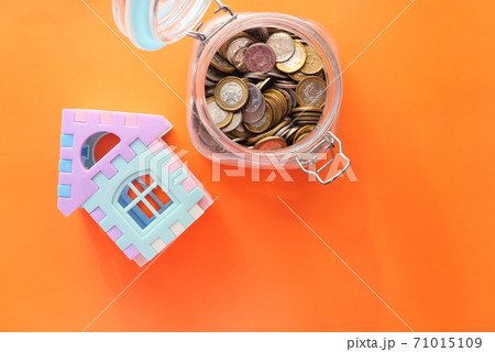 the concept of finance concept with stack of coins and house the concept of finance concept with stack of coins and house 71015109