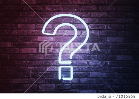 3D illustrated question mark with led light on brick wall background. 3D illustrated question mark with led light on brick wall background. 71015858