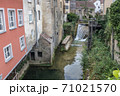 Cuissance River in the historical village of Arbois, Jura, France 71021570