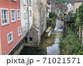 Cuissance River in the historical village of Arbois, Jura, France 71021571