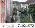 Cuissance River in the historical village of Arbois, Jura, France 71021572