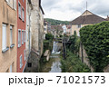 Cuissance River in the historical village of Arbois, Jura, France 71021573