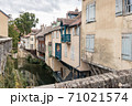 Cuissance River in the historical village of Arbois, Jura, France 71021574