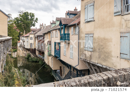 Cuissance River in the historical village of Arbois, Jura, France 71021574