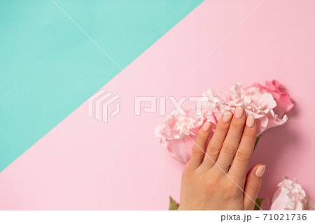 Pink rose with hands on background Pink rose with hands on background 71021736