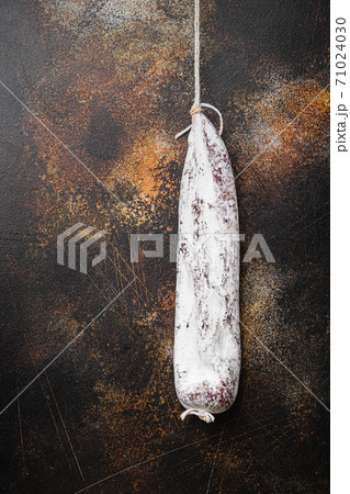 Longaniza wurst on dark background, flat lay with copy space Longaniza wurst on dark background, flat lay with copy space 71024030