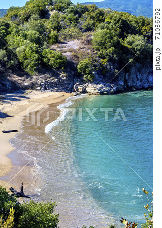 Virgin beach with blue water near Olympiada village, Halkidiki, Greece 71036792