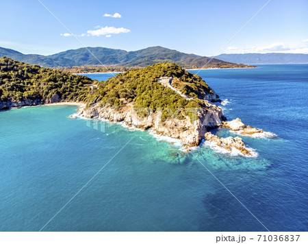 Drone aerial view of sea and rocks in Olympiada, Halkidiki, Greece Drone aerial view of sea and rocks in Olympiada, Halkidiki, Greece 71036837