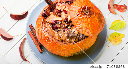 Tasty autumn stuffed pumpkin 71036868